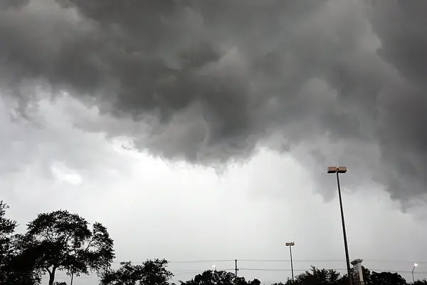 Storm clouds over a parking lot