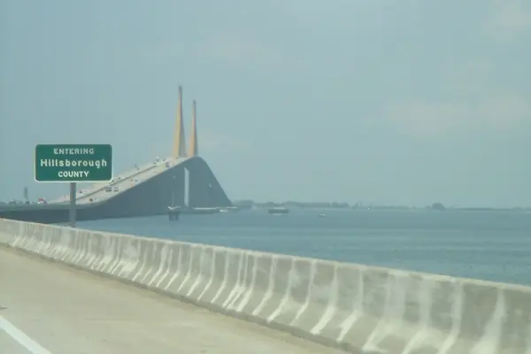 County line sign on a bridge approach