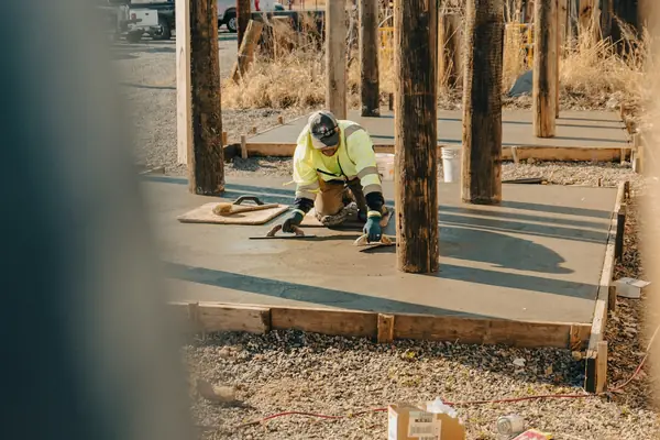 Finishing a slab inside a post frame building