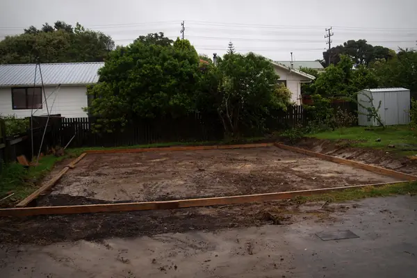 Forms staked for a large shed pad