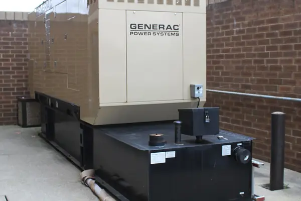 Standby generator on a fuel tank base